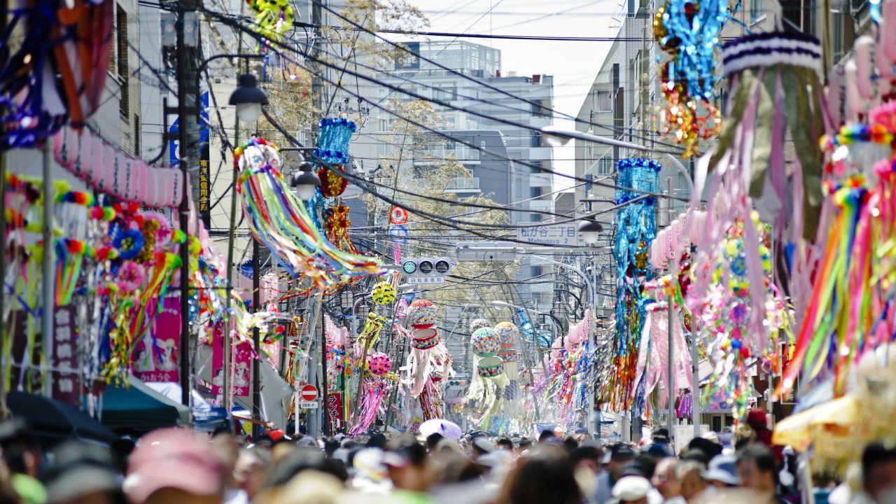Japan's Tanabata Festival involves people writing their wishes on strips of paper to hang on bamboo trees.